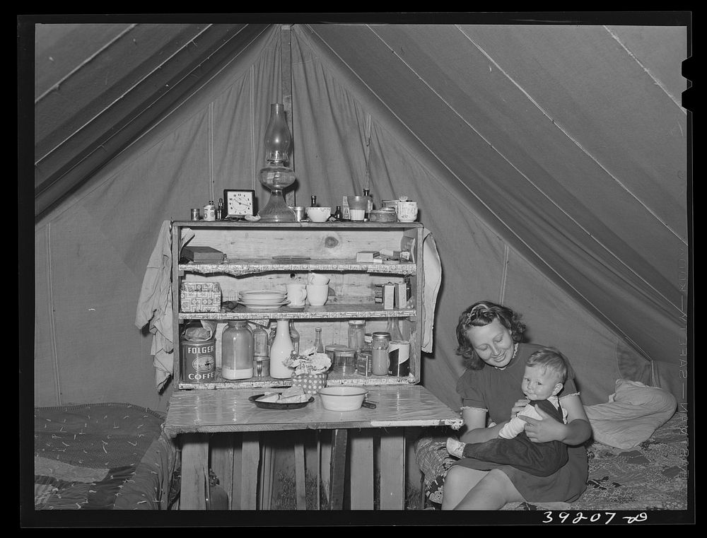 Mother and child at the FSA (Farm Security Administration) migratory labor camp mobile unit. Wilder, Idaho by Russell Lee