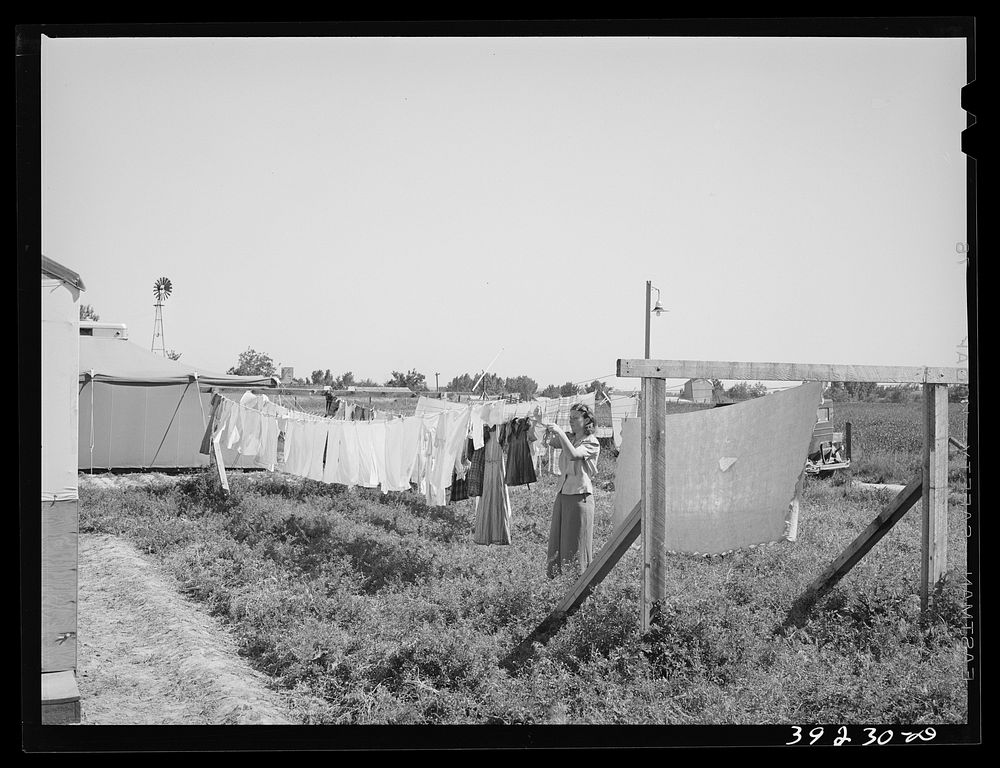 Laundry on the line. FSA (Farm Security Administration) migratory labor camp mobile unit. Wilder, Idaho by Russell Lee