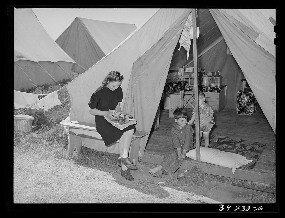 Family of farm worker living at FSA (Farm Security Administration) migratory labor camp mobile unit. Wilder, Idaho by…