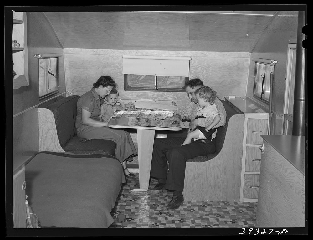 Family of Rohr Aircrafts worker in their trailer home at the FSA (Farm Security Administration) camp for defense workers.…