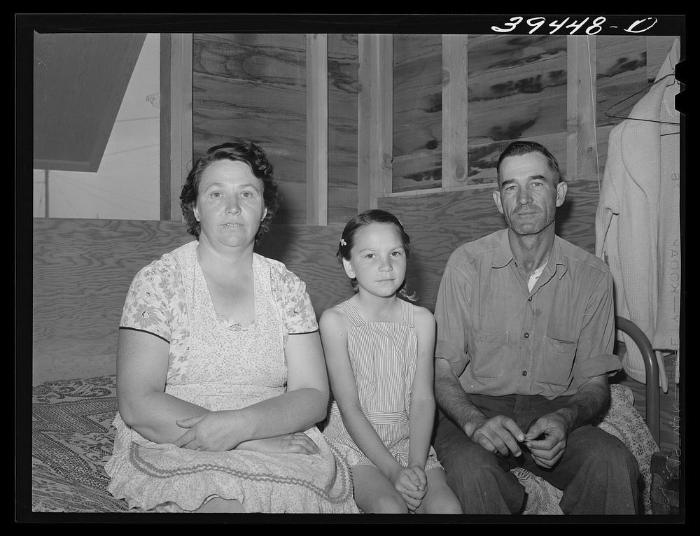 Migratory farm worker, his wife and daughter in shelter at the FSA (Farm Security Administration) labor camp. Caldwell…