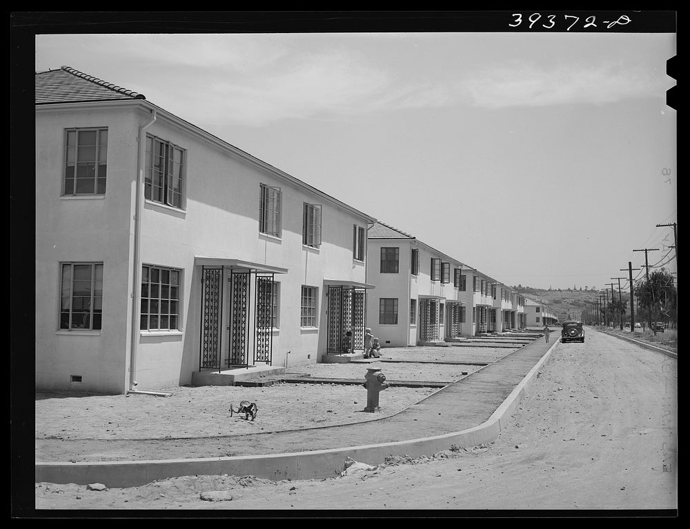 Row of multiple family dwelling at the Navy defense housing project for enlisted men--Marines and Navy. San Diego…