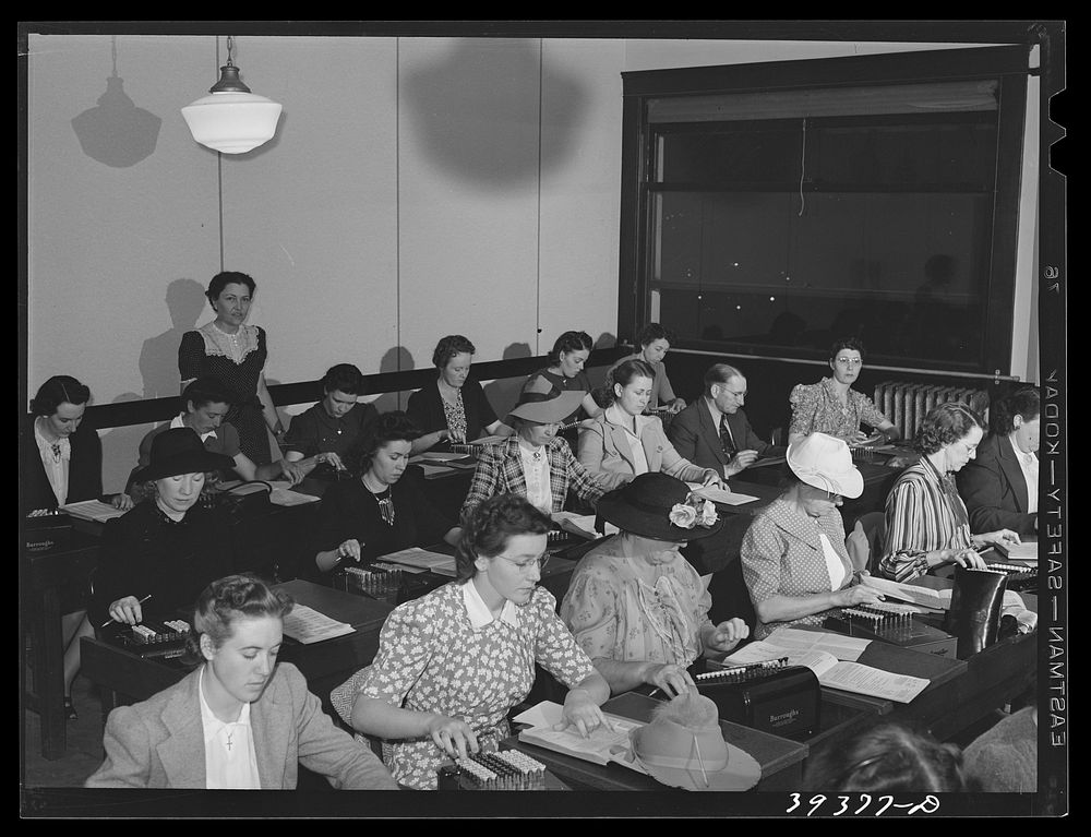 [Untitled photo, possibly related to: Class in machine education at the San Diego Vocational School. There are forty to…