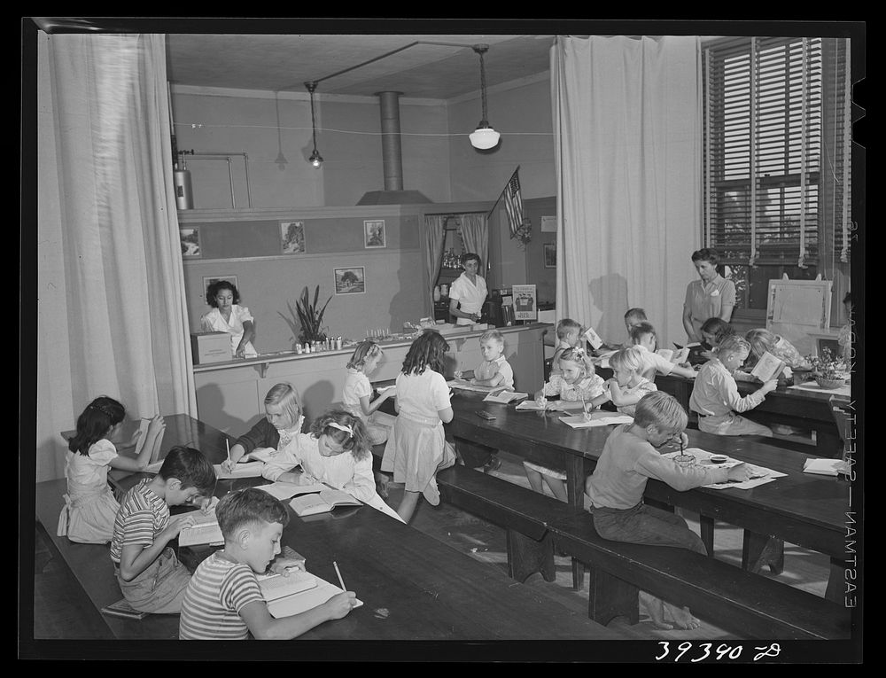 Second and third grades at the Balboa School, San Diego, attend classes held in the cafeteria of the school. San Diego…