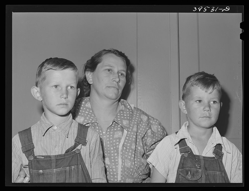 Mother and her boys. FSA (Farm Security Administration) farm labor camp. Caldwell, Idaho by Russell Lee