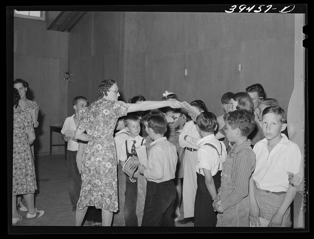 [Untitled photo, possibly related to: Schoolchildren and their teacher in program at the end of school term. FSA (Farm…