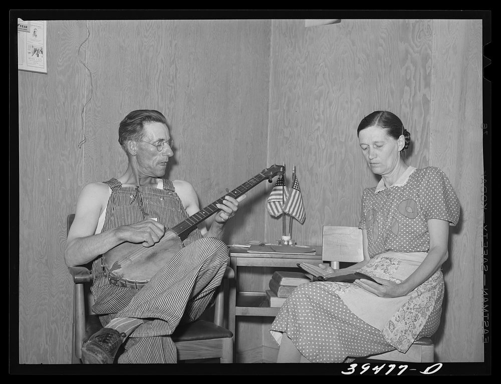 Farm worker and his wife in their cottage home at the FSA (Farm Security Administration) labor camp. Caldwell, Idaho by…
