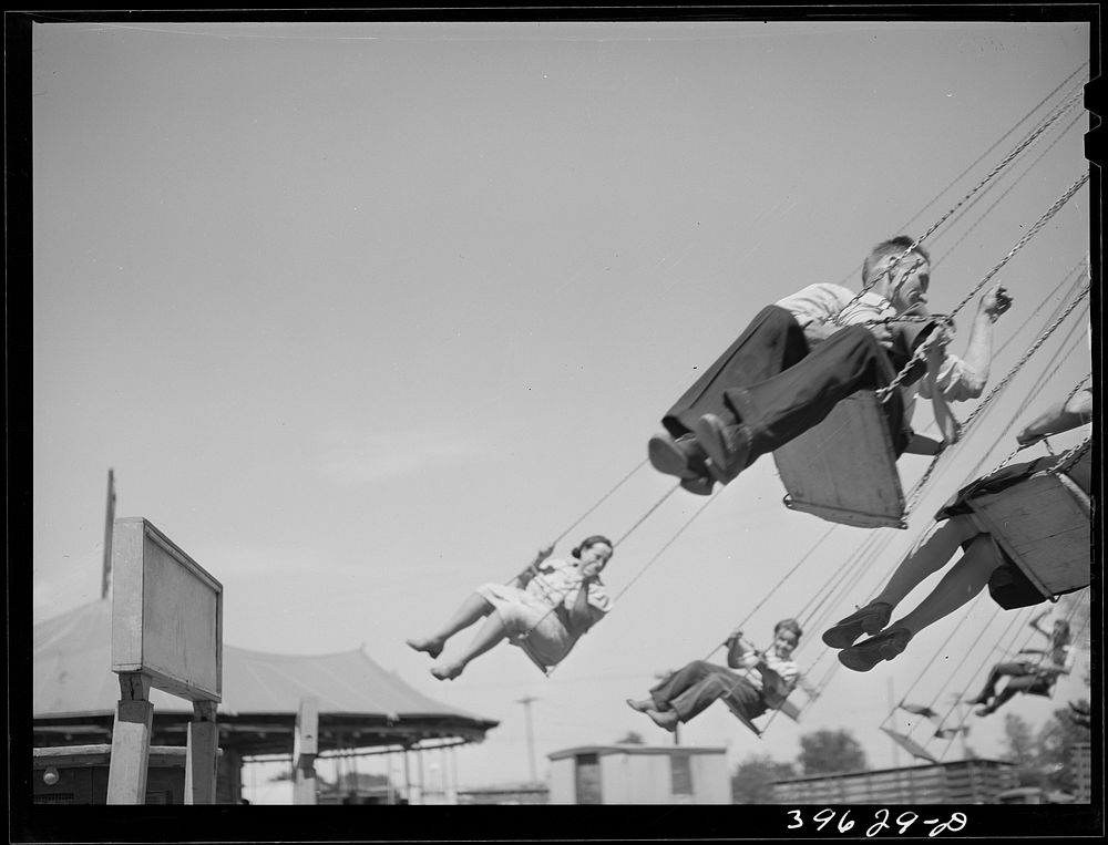 Ride at the carnival which was part of the Fourth of July celebration at Vale, Oregon by Russell Lee