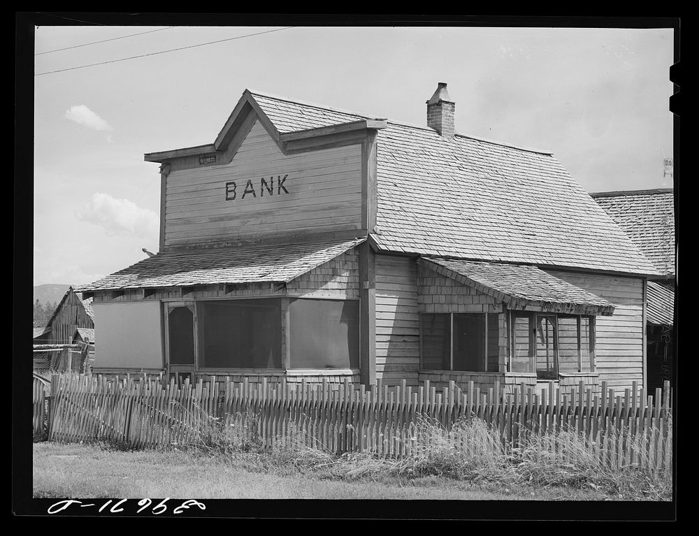 Old bank building now used as residence. Cascade, Idaho. The town moved from its old location to the highway about a mile…