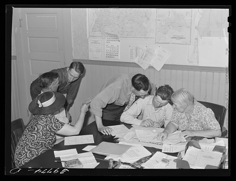 FSA (Farm Security Administration) clients making plans for farms in county supervisor's office. Grangeville, Idaho by…