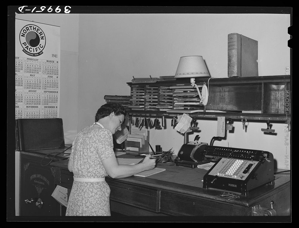 Office worker in wheat broker's office. Whitman County, Washington by Russell Lee