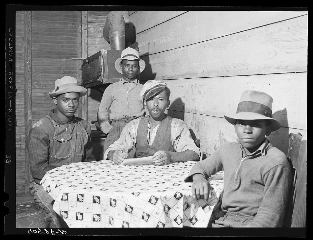 FSA (Farm Security Administration) client Roger Spence and two of his sons. Two miles out of Princess Anne, Maryland.…