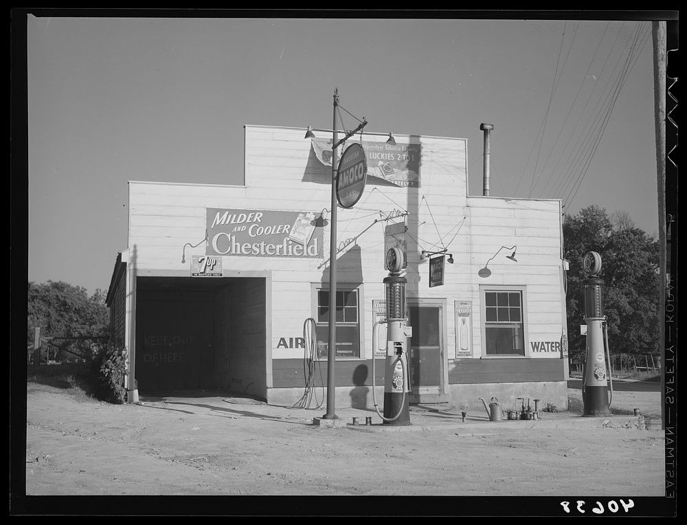 Filling station and general store operated by Mr. Coley. Stem, Granville County, North Carolina. Sourced from the Library of…