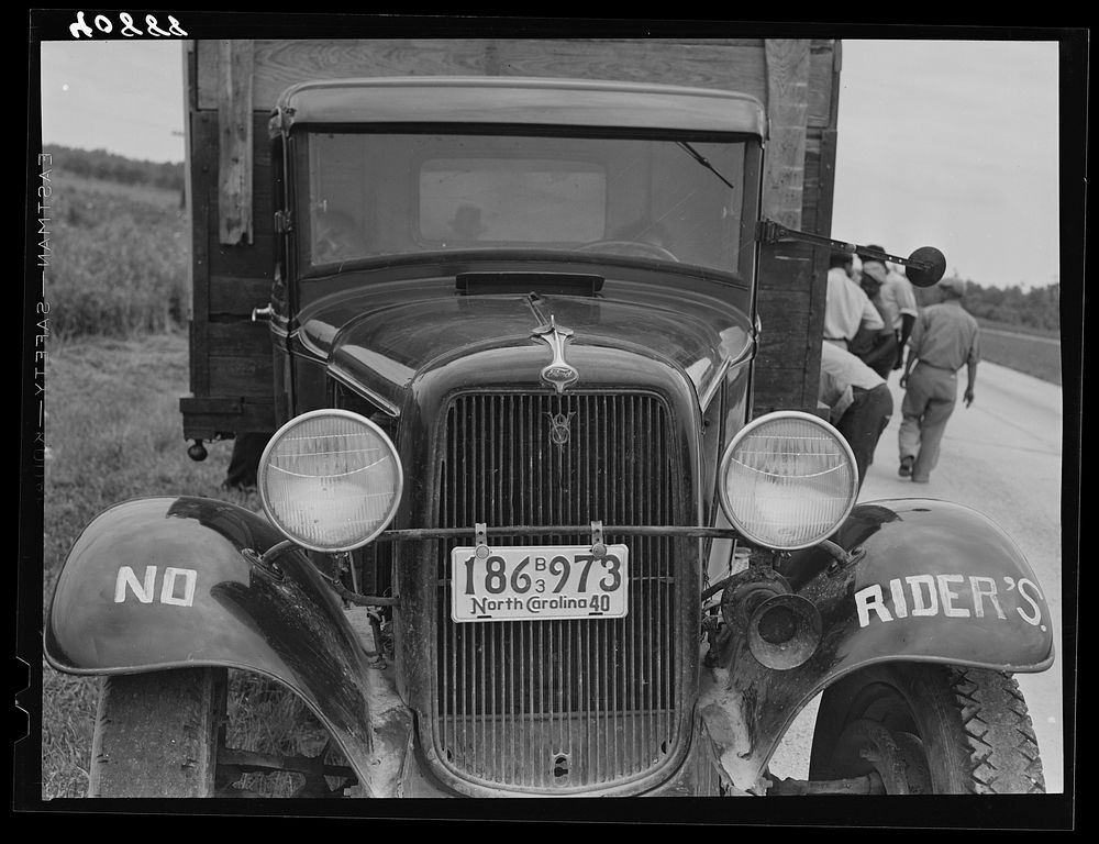 Truck of a group of thirty-five migrant workers leaving North Carolina for Easton, Maryland, to pick beans. Sourced from the…