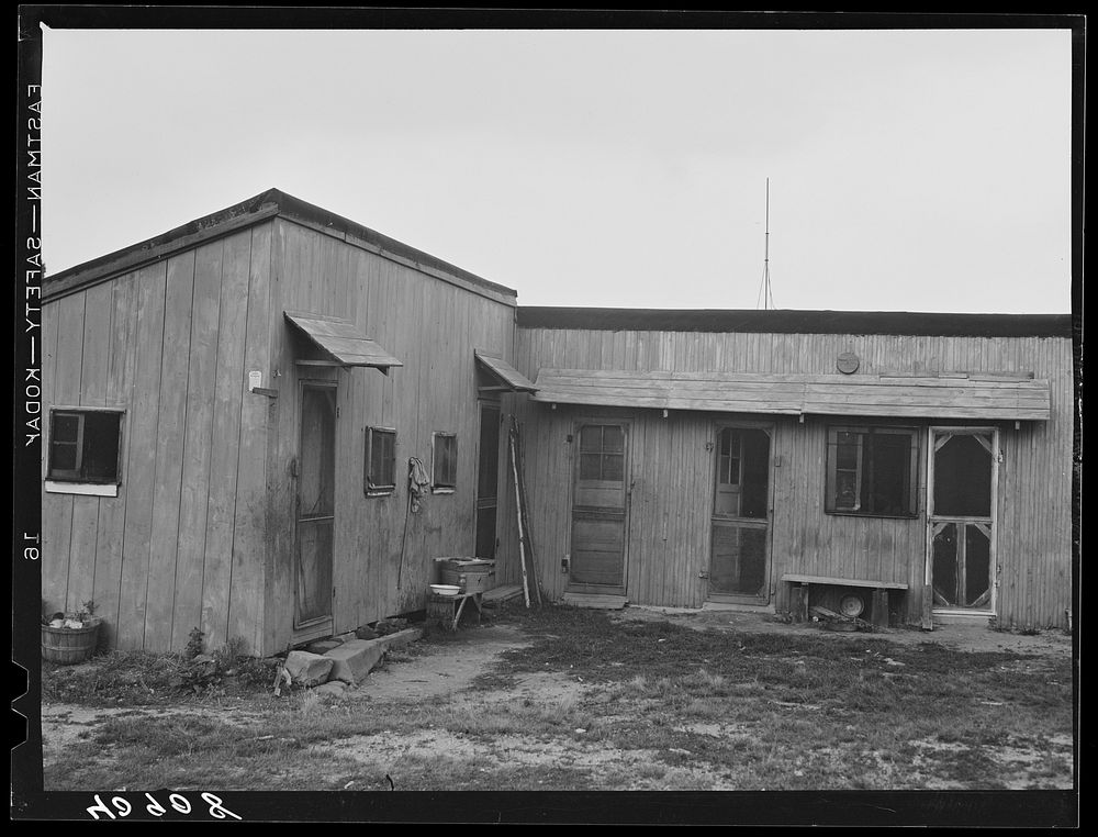 Housing for New Jersey migratory onion pickers. Near Cedarville, New Jersey. Sourced from the Library of Congress.