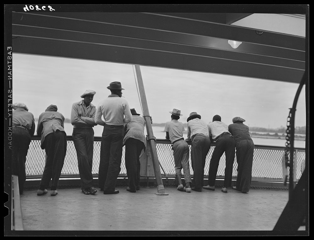Migratory agricultural workers crossing from Norfolk to Cape Charles on the ferry. This group has just finished picking…