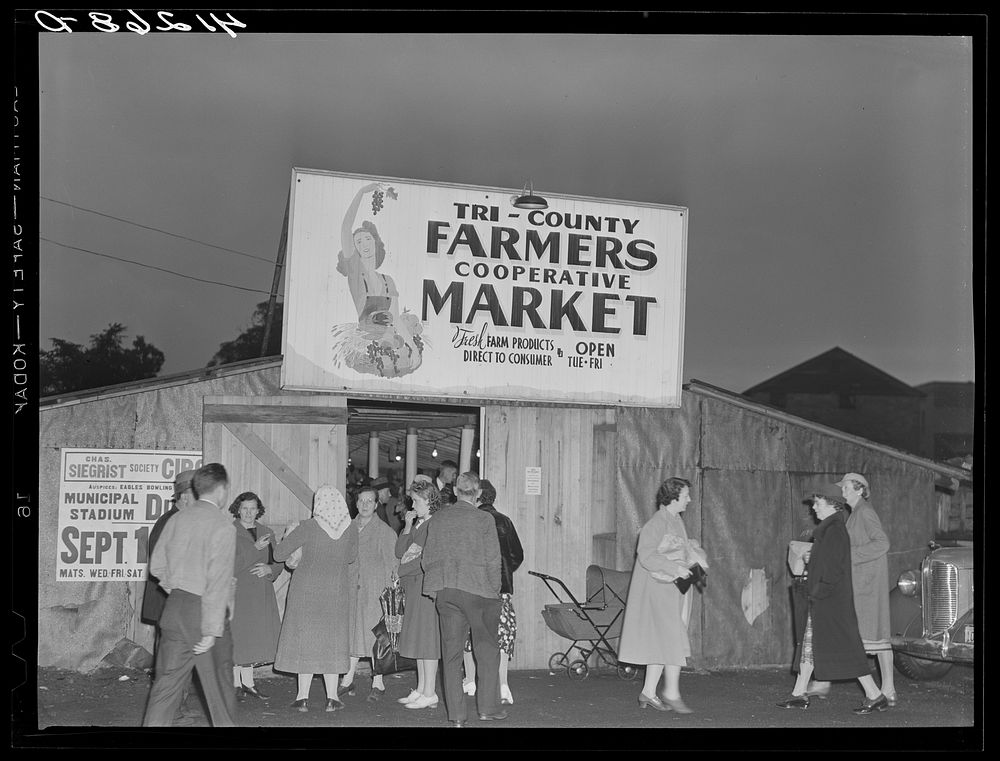 Customers in front of the Tri-County Farmers Co-op Market at Du Bois, Pennsylvania. Sourced from the Library of Congress.