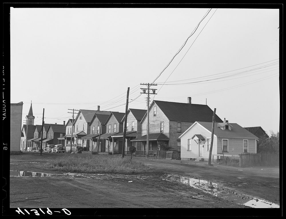 [Untitled photo, possibly related to: Houses on "other side of railroad track" in Du Bois, Pennsylvania]. Sourced from the…
