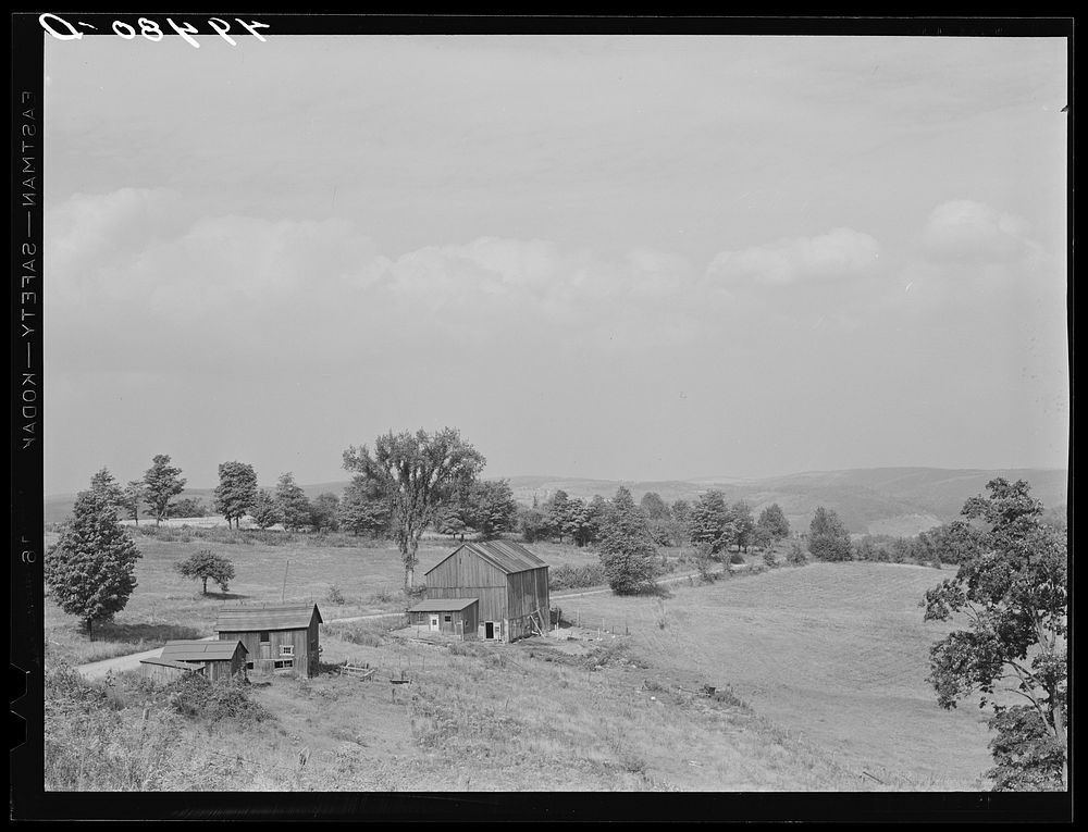 Farm buildings and landscape showing type of country in Sugar Hill, near Townsend, New York. Sourced from the Library of…