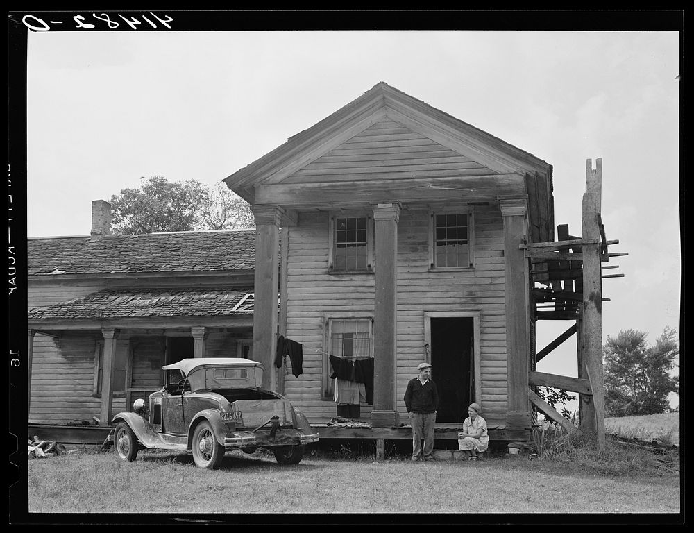 Mr. and Mrs. D'Annunzio in front of their house in Rumsey Hill. He was previously an unemployed auto mechanic in the city.…