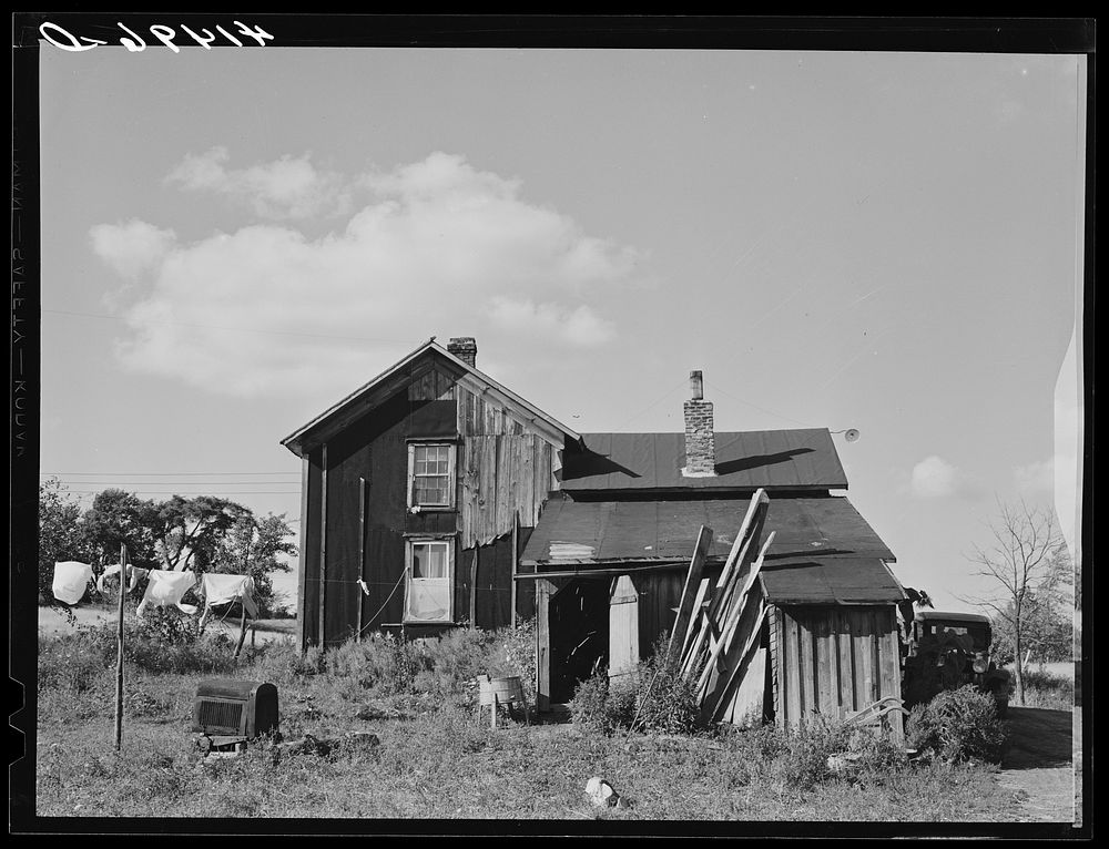 The back of Mr. Templer's house, a FSA (Farm Security Administration) client living in the submarginal area of Sugar Hill…