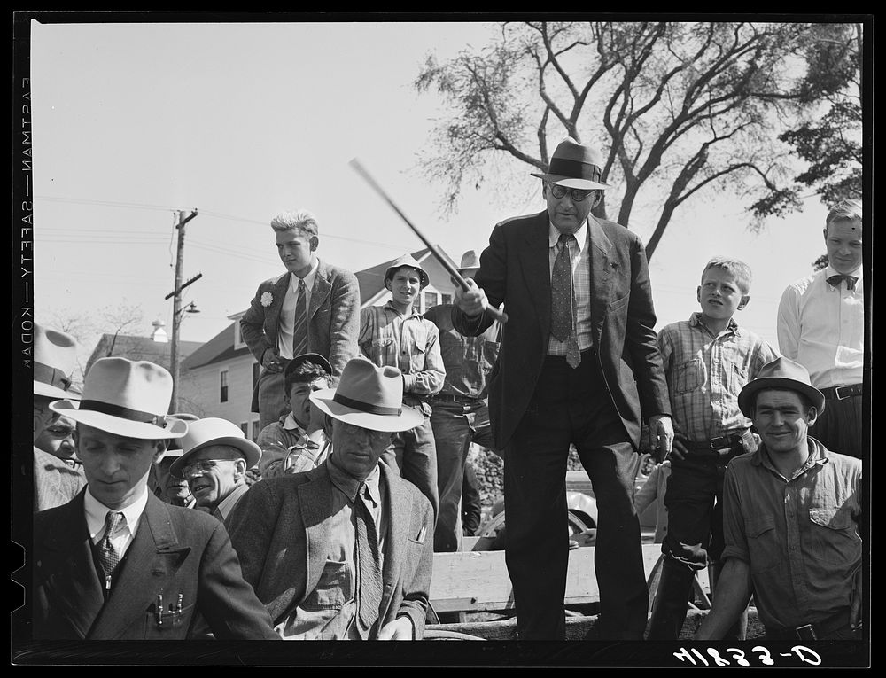 Mr. E.S. Beardsley, auctioneer. At the auction of Mr. Anthony Tacek's farm in Derby, Connnecticut. Sourced from the Library…
