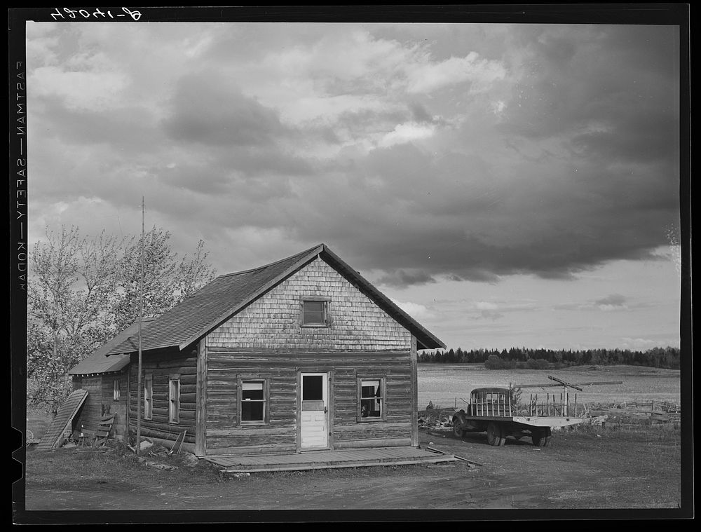 Log house occupied by French-Canadian potato farmer near Saint Agatha, Maine. Sourced from the Library of Congress.