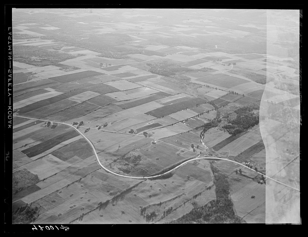 Potato farms in Aroostook County showing the layout of land. The highway curving in the foreground is U.S. 1. See general…