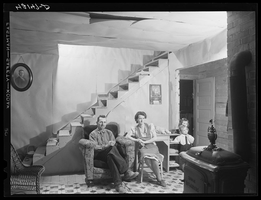 Mr. and Mrs. Lindore Labbee and their children in their newly-built home. Mr. Labbe, FSA (Farm Security Administration)…