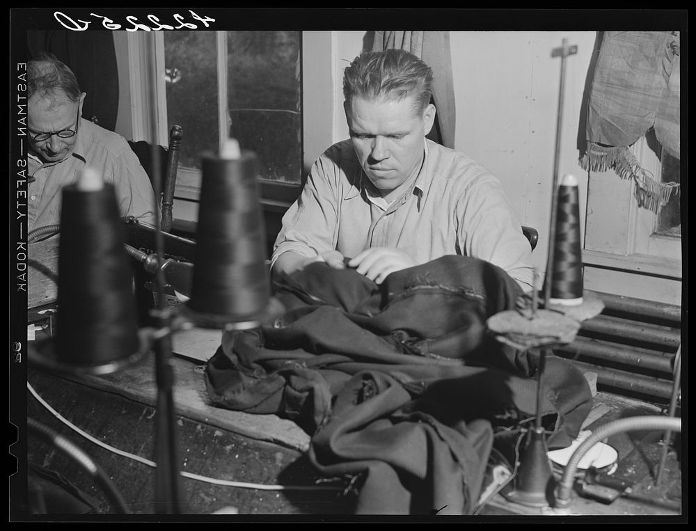 A Polish farmer who works in the Levine & Levine dress and coat factory in Colchester, Connecticut. Sourced from the Library…