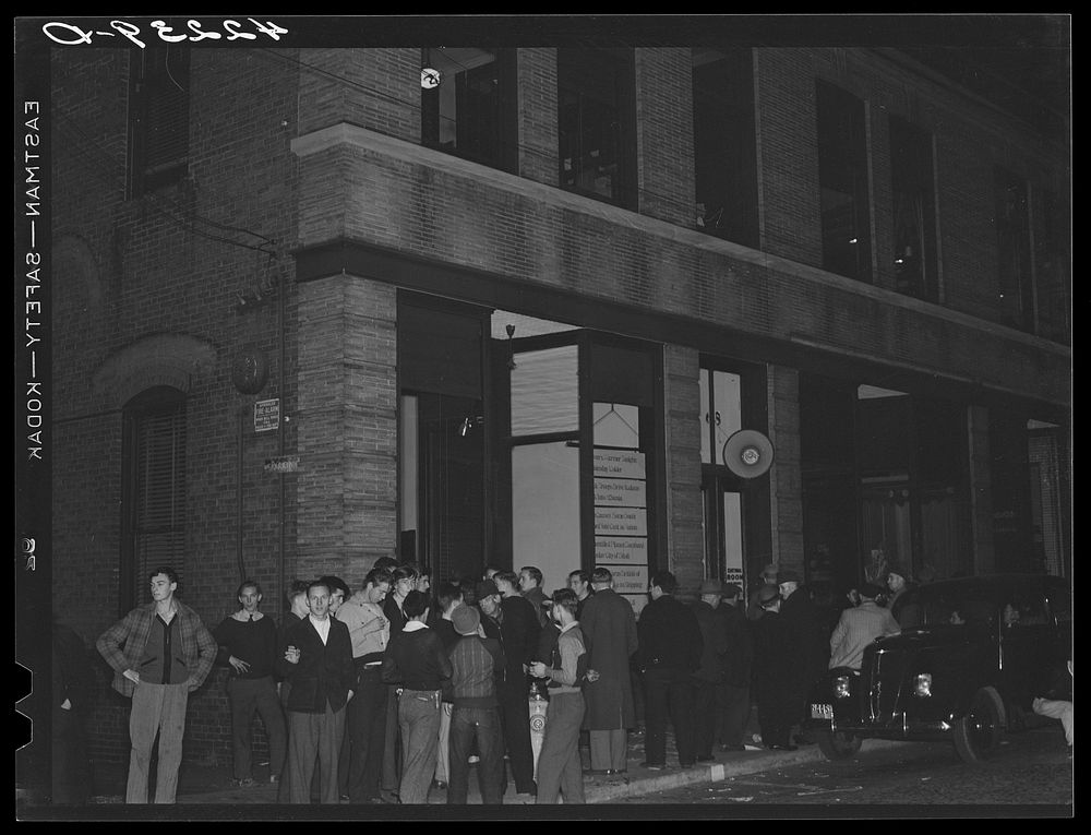 Crowds gathered around the "Norwich Express" newspaper office listening to the election returns. Norwich Connecticut.…
