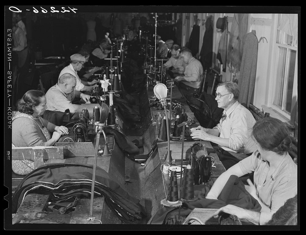 Workers in the small ladies coat factory in Colchester, Connecticut (Levine & Levine ladies coats). Most of the workers live…