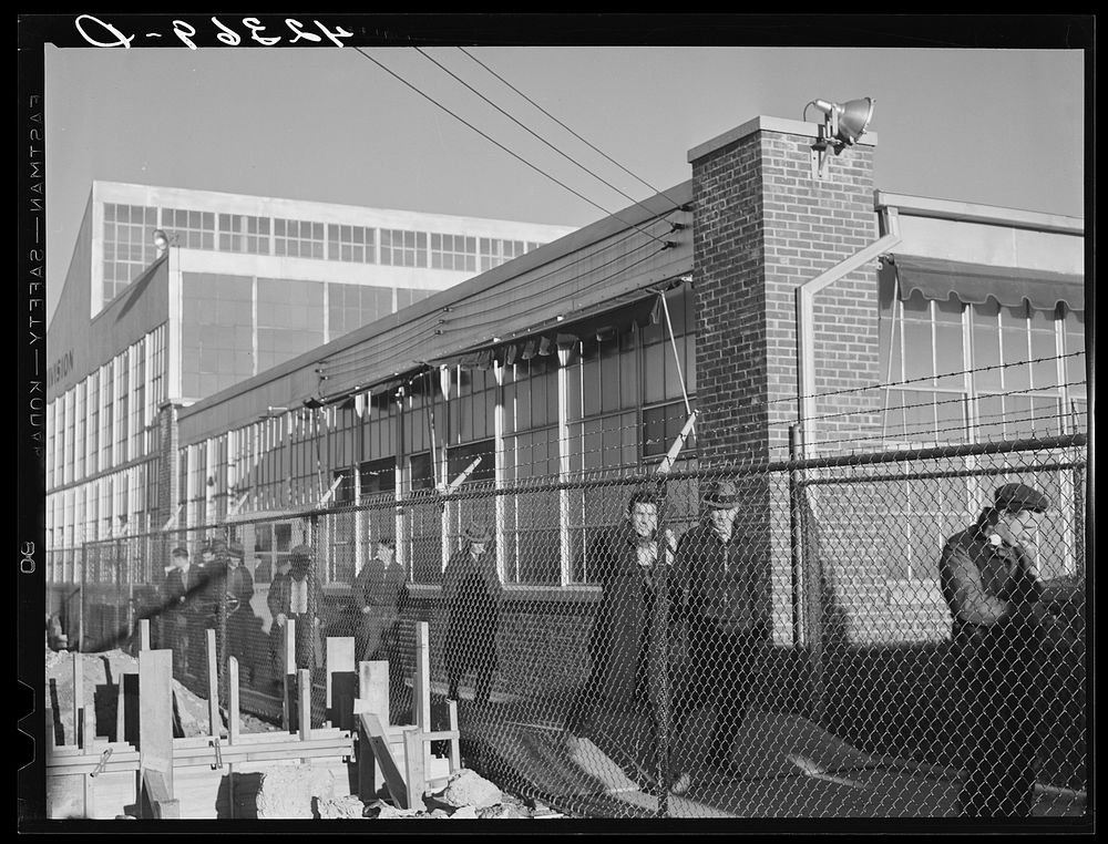 Workmen leaving the plant at the Vought Sikorsky Aircraft Corporation. Stratford, Connecticut. Sourced from the Library of…