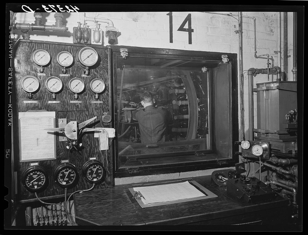 At the testing chamber for motors at the Pratt and Whitney Aircraft Corporation. After the engine is set up inside the…