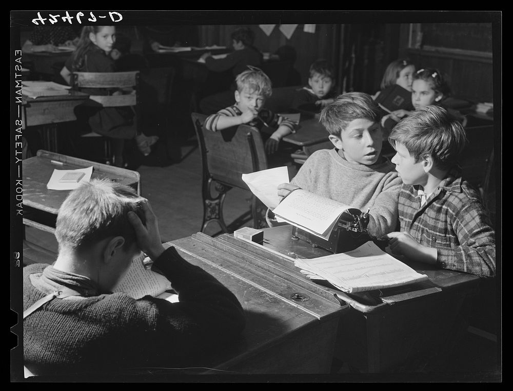 Boys in the schoolhouse in Ledyard, Connecticut, working on the school newspaper. Sourced from the Library of Congress.