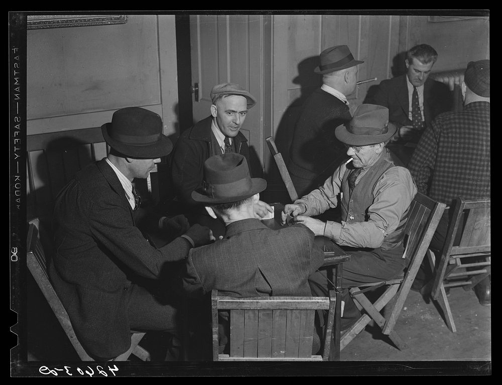 [Untitled photo, possibly related to: Shipyard workers playing cards at the "Senator Baxter," a hotel, recreation hall and…