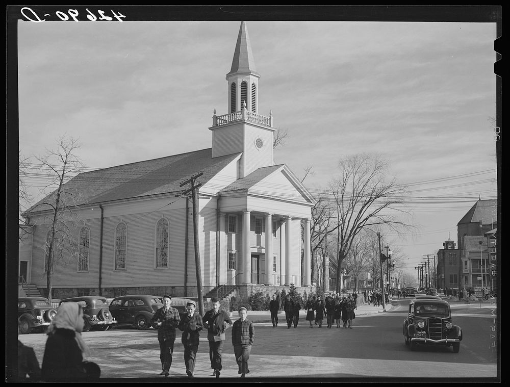Children getting out of school at three-thirty in Woonsocket, Rhode Island. Sourced from the Library of Congress.
