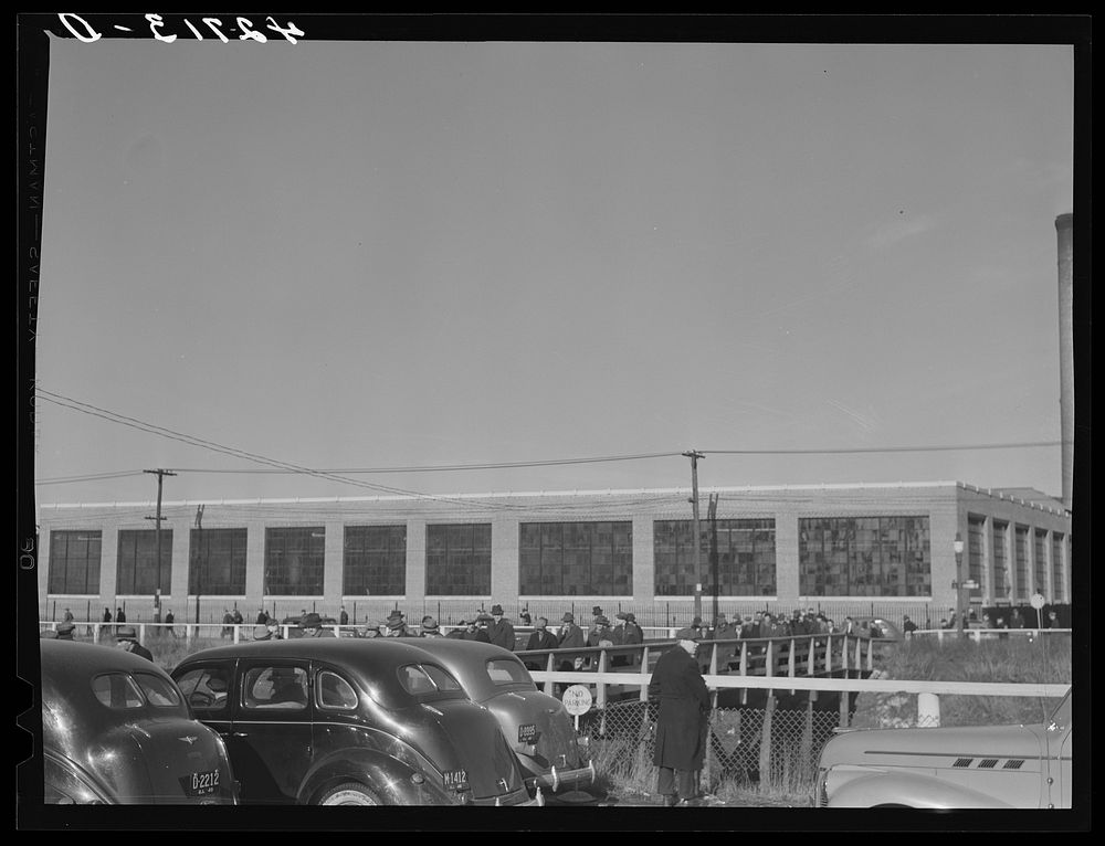 [Untitled photo, possibly related to: Men leaving the Browne and Sharpe Manufacturing Company in Providence, Rhode Island at…