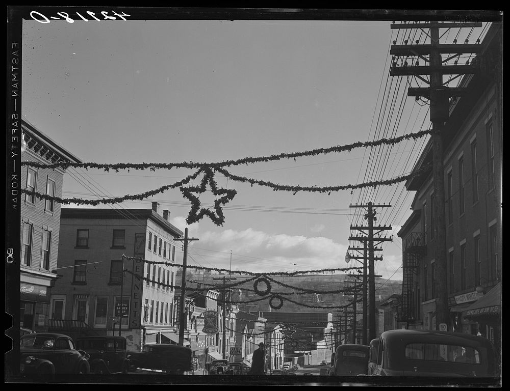 The main street of Derby, Connecticut, decorated for the Christmas season. Sourced from the Library of Congress.