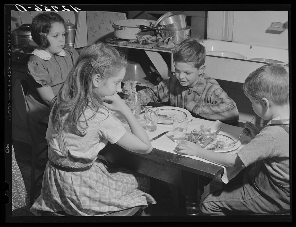 The children's table at the Crouch family Thanksgiving Day dinner. Ledyard, Connecticut. Sourced from the Library of…