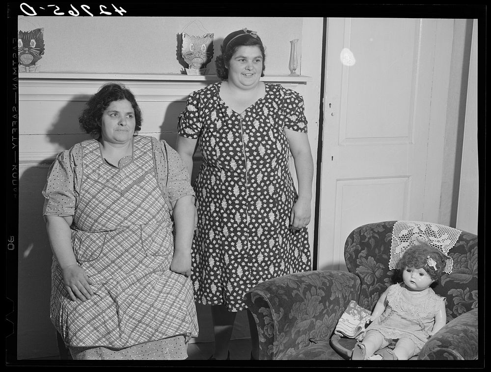 Mrs. Botello and her sister, Portuguese FSA (Farm Security Administration) clients. Portsmouth, Rhode Island. Sourced from…