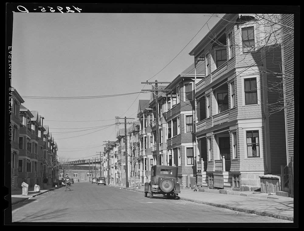 [Untitled photo, possibly related to: Row of houses on a street in New Bedford, Massachusetts]. Sourced from the Library of…