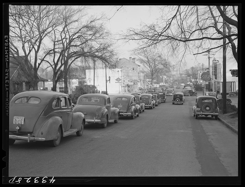 [Untitled photo, possibly related to: A street in Fayetteville, North Carolina about 4:30 p.m. when workers are coming out…