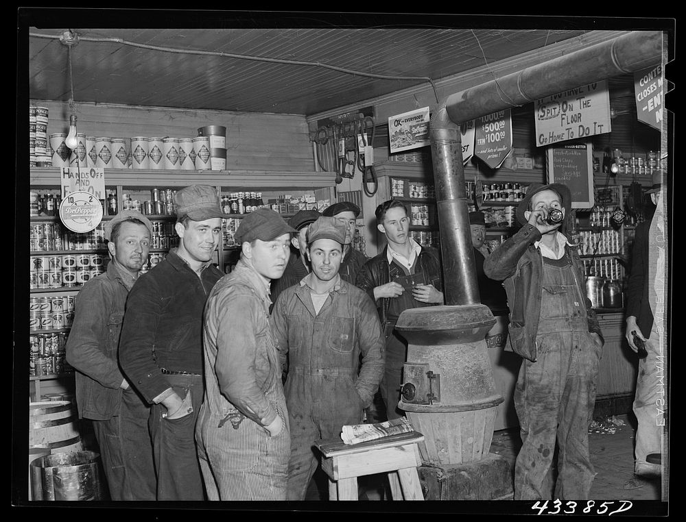Construction workers from Fort Bragg in a general store in Manchester, North Carolina. Sourced from the Library of Congress.