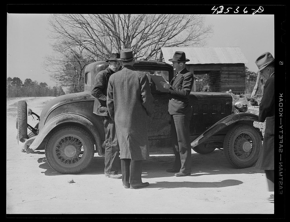 [Untitled photo, possibly related to: FSA (Farm Security Administration) representative interviewing a farmer who must move…