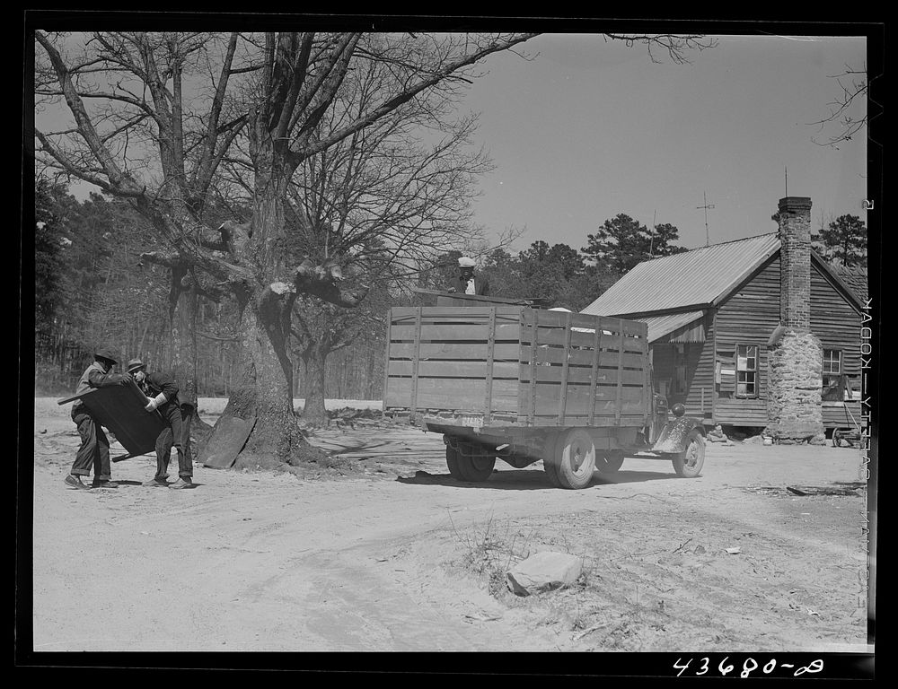 [Untitled photo, possibly related to:  family moving to a new home out of Camp Croft area. Near Spartanburg, South…