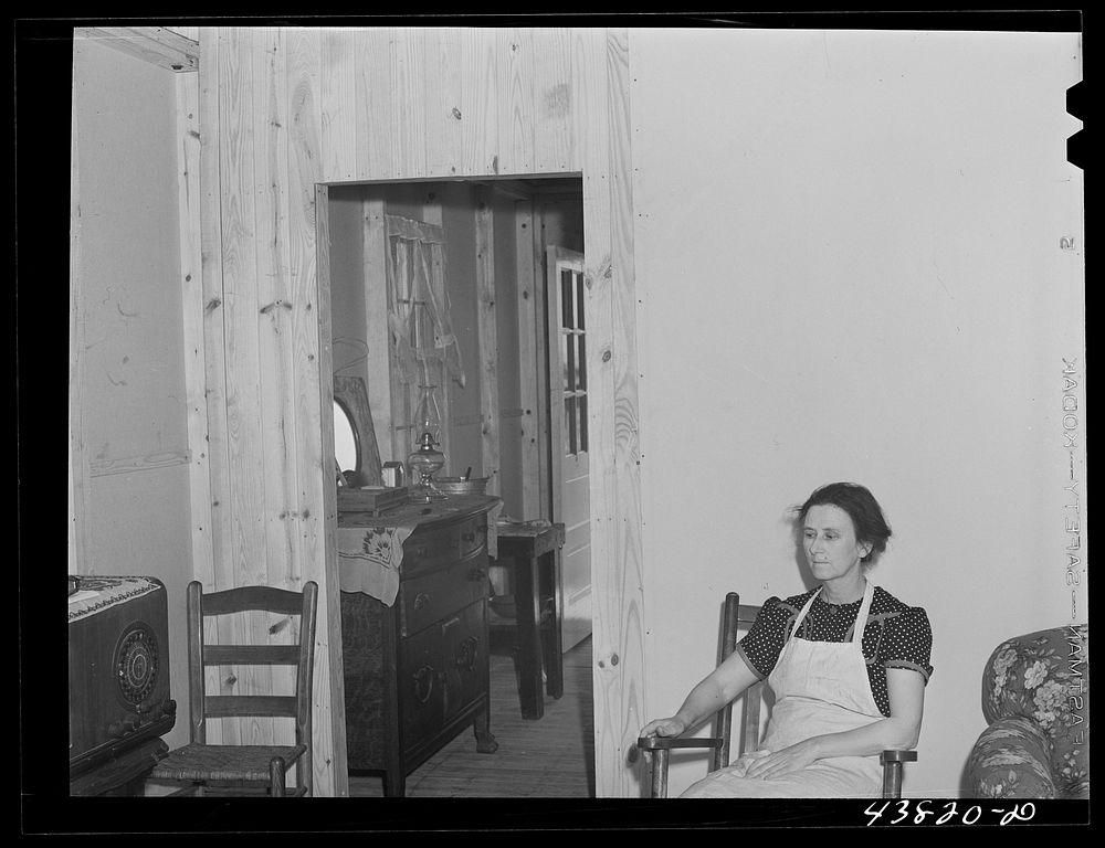 [Untitled photo, possibly related to: Mrs. Jennings, tired out after a day of moving into her new prefabricated house in…