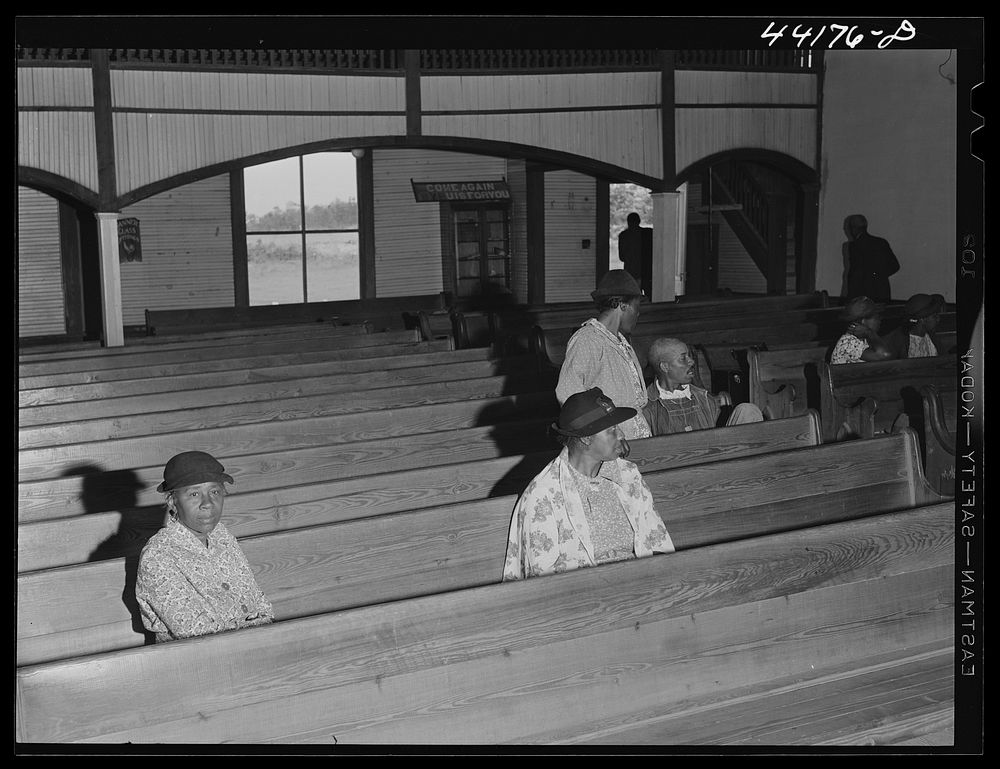 [Untitled photo, possibly related to: At a meeting of  FSA (Farm Security Administration) borrowers in a church near…