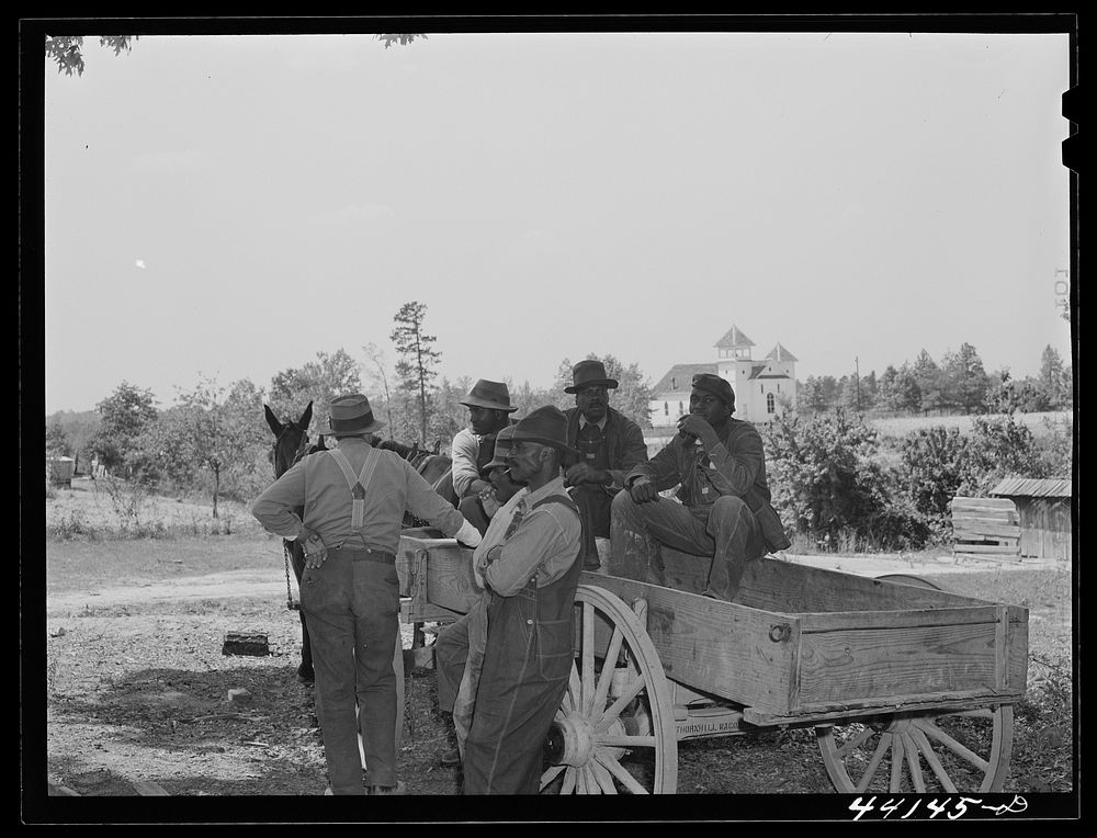[Untitled photo, possibly related to: Waiting for FSA (Farm Security Administration) meeting of  borrowers to begin. Near…