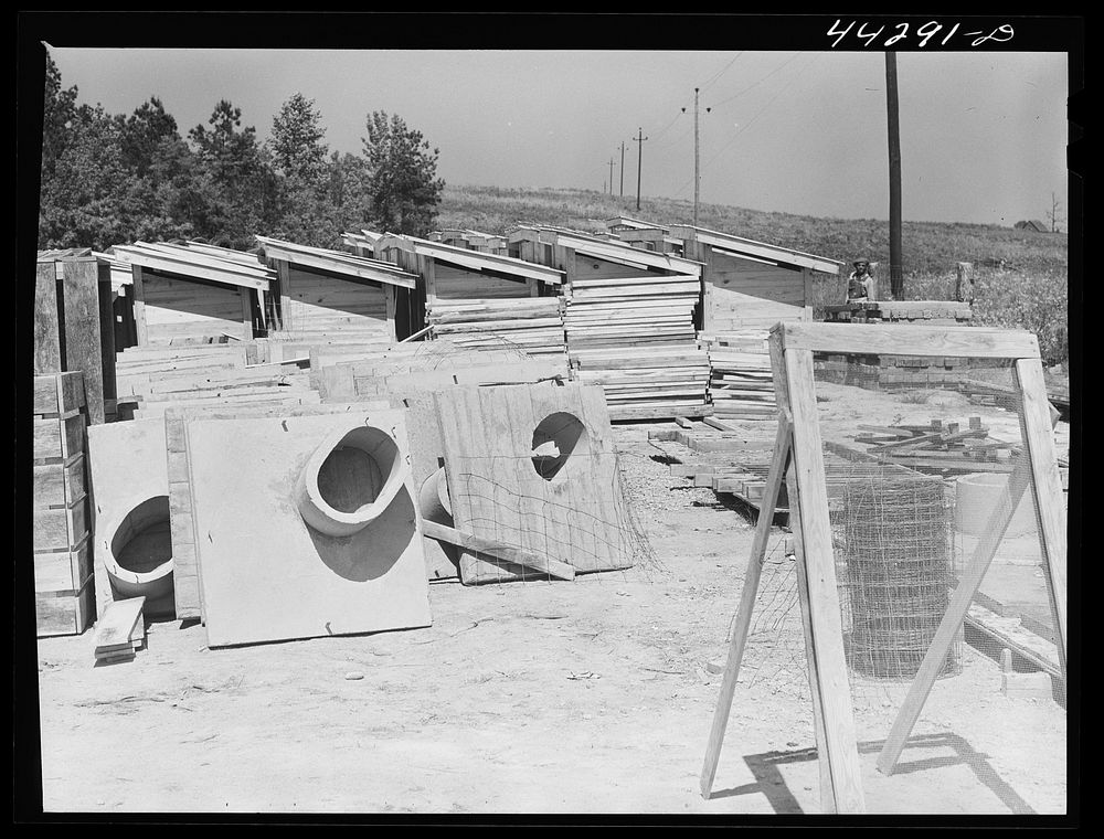 Privies being built by FSA (Farm Security Administration). Greene County, Georgia. Sourced from the Library of Congress.